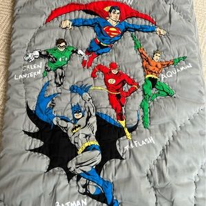 Pottery Barn sleeping bag featuring classic DC Comics superheroes